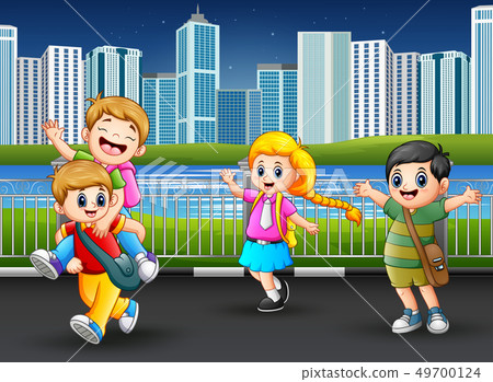Happy school children at the city park Happy school children at the city park 49700124