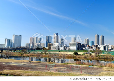 Musashi Kosugi skyscrapers from the Tama River bank 49704786