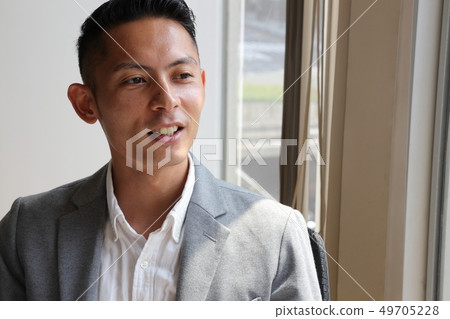 Smiling businessman Smiling businessman 49705228