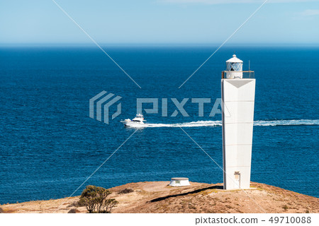 Cape Jervis Lighthouse and boat Cape Jervis Lighthouse and boat 49710088