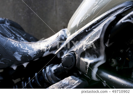 Close-up photo of motorcycle bike Close-up photo of motorcycle bike 49710902