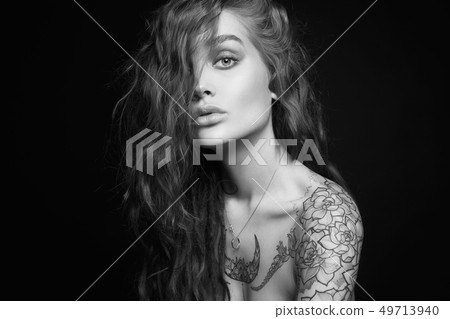 Sexy Young Woman with Tattoo Sexy Young Woman with Tattoo 49713940