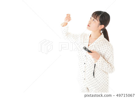 Young woman using a flashlight Young woman using a flashlight 49715067