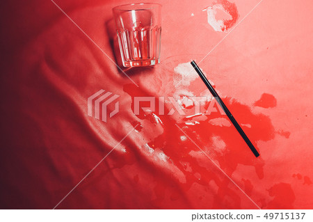 Red spot from leaked fallen wine glass. 49715137