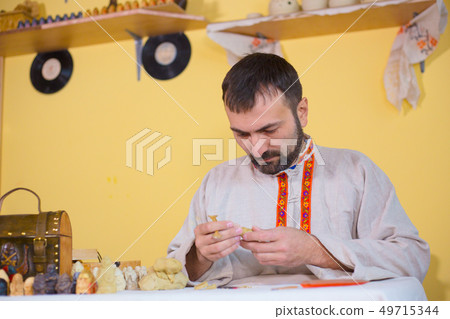 Potter making clay figure for board game Potter making clay figure for board game 49715344