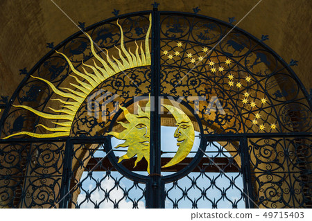 Ornaments of wrought iron fence with gate Ornaments of wrought iron fence with gate 49715403