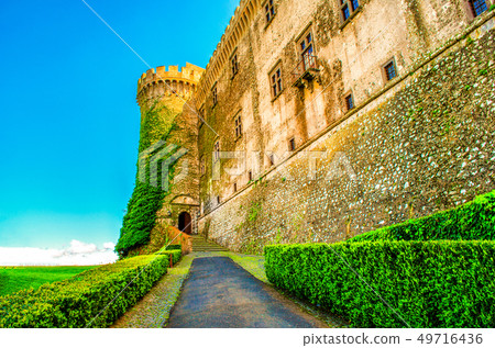entry castle Bracciano vine plants - Bracciano castle is famous italy destination landmark near Rome entry castle Bracciano vine plants - Bracciano castle is famous italy destination landmark near Rome 49716436
