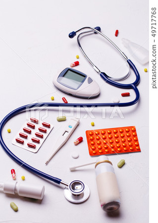 Cold medicine, thermometer, phonendoscope 49717768