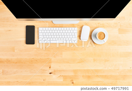 Top view of large desktop computer on wooden table 49717991