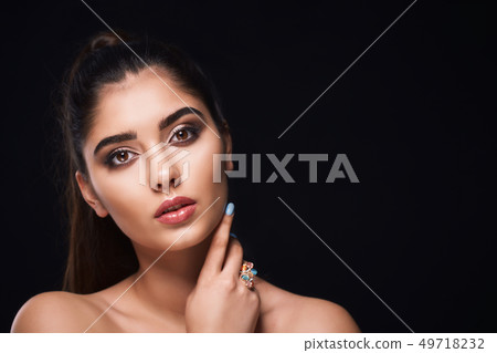 Classic close up vogue beauty portrait with professional make up and hairstyle beautiful girl in Classic close up vogue beauty portrait with professional make up and hairstyle beautiful girl in 49718232