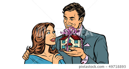 Husband and wife. House as a gift isolate on white background 49718893