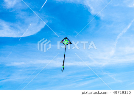Kites flying in the sky among the clouds.Kite 49719330