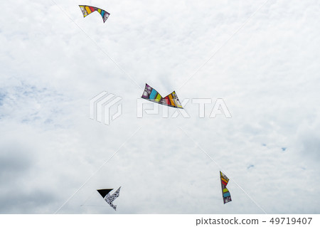 Kites flying in the sky among the clouds.Kite Kites flying in the sky among the clouds.Kite 49719407