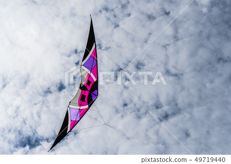 Kites flying in the sky among the clouds.Kite Kites flying in the sky among the clouds.Kite 49719440