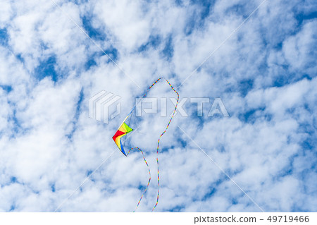 Kites flying in the sky among the clouds.Kite Kites flying in the sky among the clouds.Kite 49719466