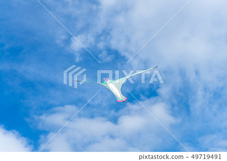 Kites flying in the sky among the clouds.Kite Kites flying in the sky among the clouds.Kite 49719491