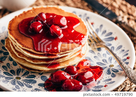 Stack of pancakes with dogwood berry marmalade 49719790