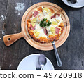 home made pizza on wooden table,delicious and yum 49720918