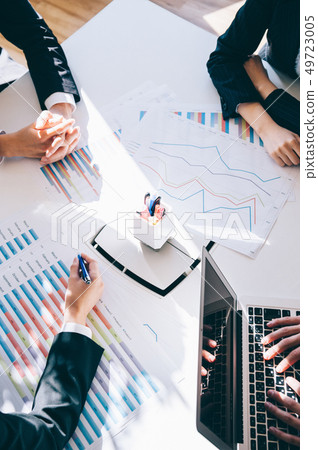 The hands of employees meeting in the office 49723005