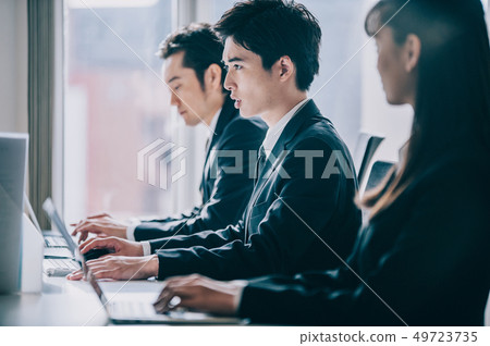 Two of boss and new employee who go to PC side by side Two of boss and new employee who go to PC side by side 49723735