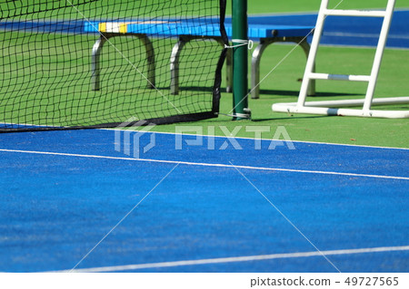 Tennis court over the wire mesh Tennis court over the wire mesh 49727565