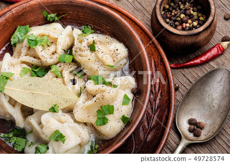 Dumplings on a plate Dumplings on a plate 49728574