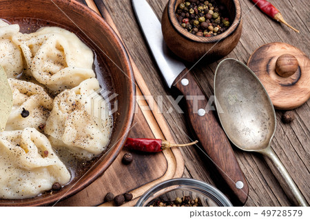 Homemade dumplings in bowl Homemade dumplings in bowl 49728579