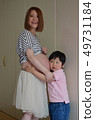 Pregnant woman and boy 49731184