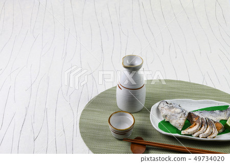 A bowl of sushi with sushi 49734020