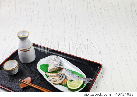 A bowl of sushi with sushi 49734035