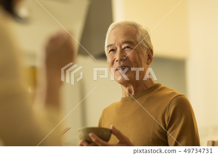 Senior male dinner Senior male dinner 49734731