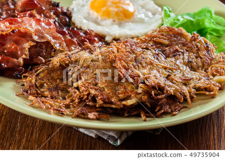 Hash browns. Potato pancakes with crispy fried 49735904