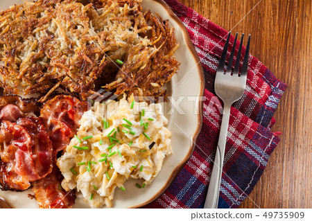 Hash browns. Potato pancakes with crispy fried 49735909