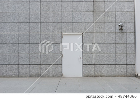 sidewalk by street wall & door 49744366