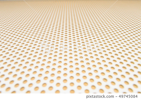 White metal plate with many small circular holes White metal plate with many small circular holes 49745084