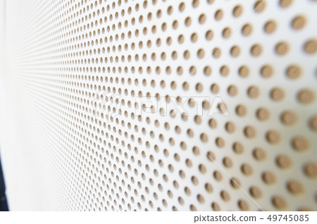 White metal plate with many small circular holes White metal plate with many small circular holes 49745085