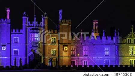 Illuminated Hampton Court Palace by night 49745808