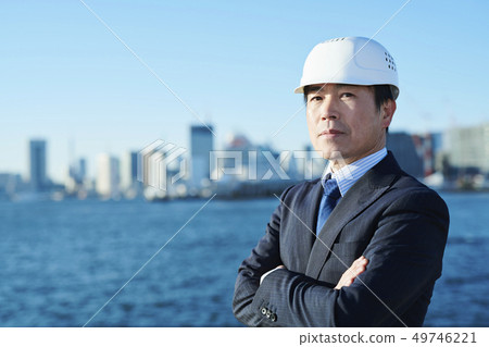 Middle businessman construction blue sky Middle businessman construction blue sky 49746221