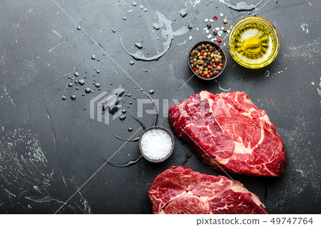 Raw marbled meat steak Ribeye Raw marbled meat steak Ribeye 49747764