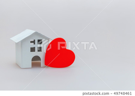 Simply minimal design with miniature white toy 49748461