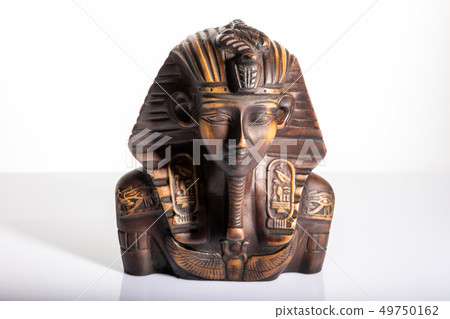 Tutankhamun, isolated portrait sculpture of an Egyptian pharaoh Tutankhamun, isolated portrait sculpture of an Egyptian pharaoh 49750162