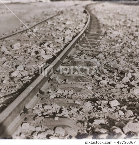 in the light of sunrise the railway road 49750367
