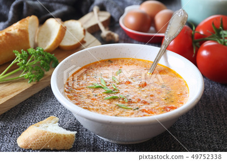 Italian cuisine. Stracciatella tomato soup 49752338