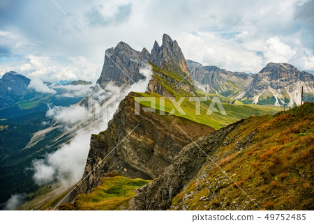 Amazing view Dolomites mountains from Seceda over Odle Puez Italy Amazing view Dolomites mountains from Seceda over Odle Puez Italy 49752485