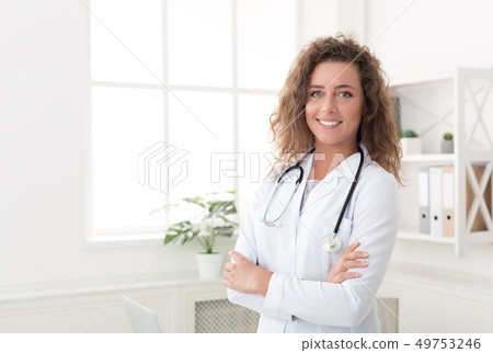 Confident physician standing in office, copy space 49753246