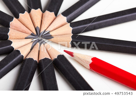 Red pencil standing out from crowd 49753543