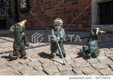 Dwarf gnome sculpture, symbol of Wroclaw, Poland Dwarf gnome sculpture, symbol of Wroclaw, Poland 49754659