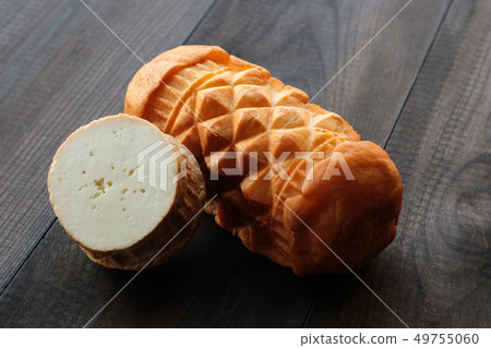 Oscypek, polish traditional smoked sheep cheese Oscypek, polish traditional smoked sheep cheese 49755060