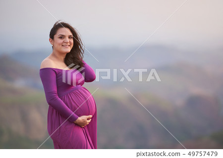 Portrait of smiling hispanic woman 49757479