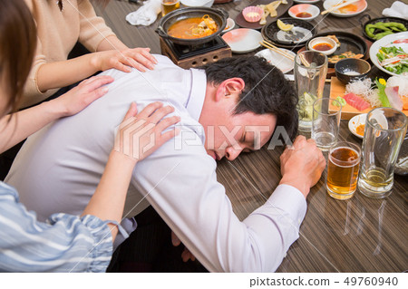 Caring for a drunken man Caring for a drunken man 49760940